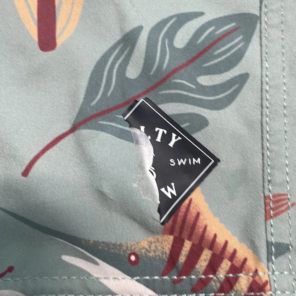 Salty Crew swim trunks size 28”, but logo on shorts is messed up. - Picture 4 of 4